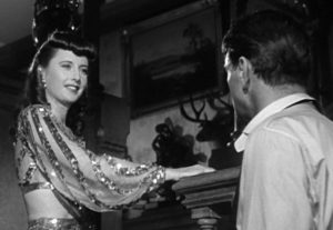 O'Shea (Stanwyck) flirting with the professors